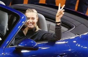 Sharapova Claims Her New Porsche, Karlovic Admitted to Hospital  