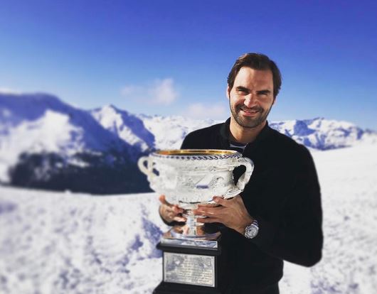 Snowbound: Federer Takes his Trophy to the Top  