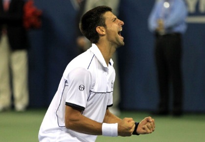 Novak Djokovic of Serbia reacts after he won match point against Rafael Nadal of Spain during the Men's Final on Day Fifteen of the 2011 US Open at the USTA Billie Jean King National Tennis Center on September 12, 2011 in the Flushing neighborhood of the Queens borough of New York City.  (Photo by Matthew Stockman/Getty Images)